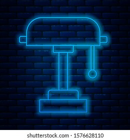 Glowing neon line Table lamp icon isolated on brick wall background.  Vector Illustration