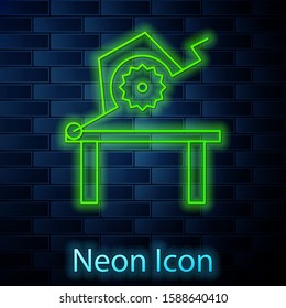 Glowing neon line Table saw for woodwork icon isolated on brick wall background. Power saw bench.  Vector Illustration