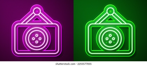 Glowing neon line Tailor shop icon isolated on purple and green background.  Vector Illustration
