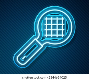 Glowing neon line Tea strainer with handle icon isolated on blue background. Metal sieve.  Vector