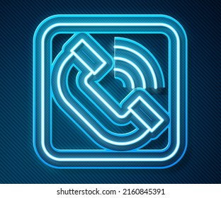 Glowing neon line Telephone handset icon isolated on blue background. Phone sign.  Vector