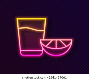 Glowing neon line Tequila glass with lemon icon isolated on black background. Mexican alcohol drink.  Vector