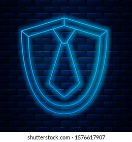 Glowing neon line Tie icon isolated on brick wall background. Necktie and neckcloth symbol.  Vector Illustration