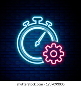 Línea de neón brillante Icono de administración de tiempo aislado en el fondo de pared de ladrillo. Señal de reloj y marcha. Símbolo de productividad. Concepto de esquema colorido. Vector