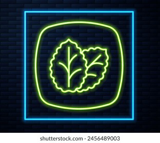 Glowing neon line Tobacco leaf icon isolated on brick wall background. Tobacco leaves.  Vector