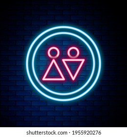 Glowing neon line Toilet icon isolated on brick wall background. WC sign. Washroom. Colorful outline concept. Vector