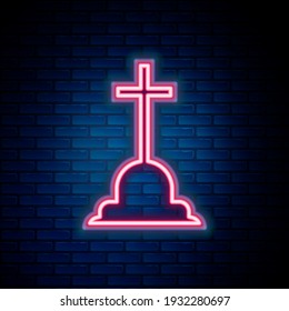 Glowing neon line Tombstone with cross icon isolated on brick wall background. Grave icon. Colorful outline concept. Vector