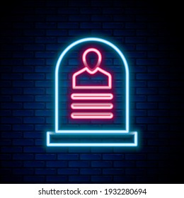 Glowing neon line Tombstone with RIP written on it icon isolated on brick wall background. Grave icon. Colorful outline concept. Vector
