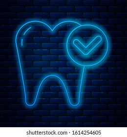 Glowing neon line Tooth whitening concept icon isolated on brick wall background. Tooth symbol for dentistry clinic or dentist medical center.  Vector Illustration