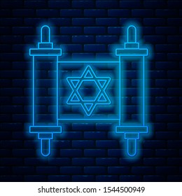 Glowing neon line Torah scroll icon isolated on brick wall background. Jewish Torah in expanded form. Star of David symbol. Old parchment scroll.  Vector Illustration