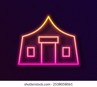 Glowing neon line Tourist tent icon isolated on black background. Camping symbol.  Vector
