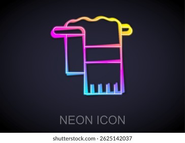 Glowing neon line Towel on hanger icon isolated on black background. Bathroom towel icon.  Vector