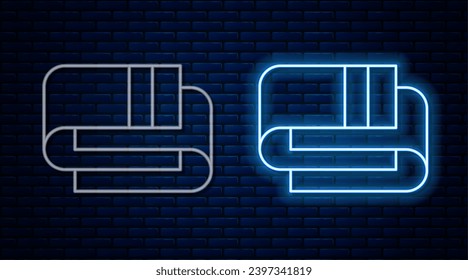 Glowing neon line Towel stack icon isolated on brick wall background.  Vector