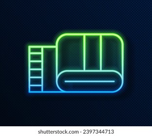 Glowing neon line Towel stack icon isolated on blue background.  Vector