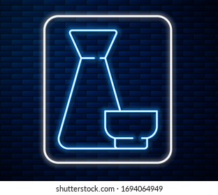 Glowing neon line Traditional Chinese tea ceremony icon isolated on brick wall background. Teapot with cup.  Vector Illustration