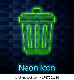 Glowing neon line Trash can icon isolated on brick wall background. Garbage bin sign. Recycle basket icon. Office trash icon. Vector Illustration