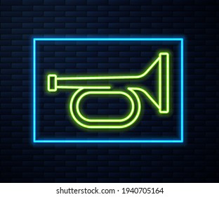 Glowing neon line Trumpet icon isolated on brick wall background. Musical instrument trumpet.  Vector