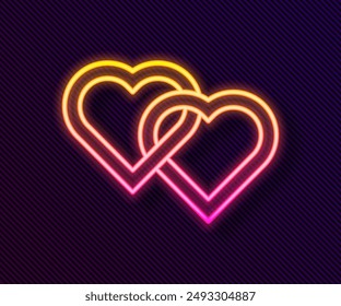 Glowing neon line Two Linked Hearts icon isolated on black background. Romantic symbol linked, join, passion and wedding. Valentine day.  Vector