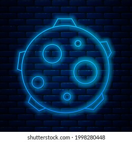 Glowing neon line UFO abducts cow icon isolated on brick wall background. Flying saucer. Alien space ship. Futuristic unknown flying object.  Vector Illustration