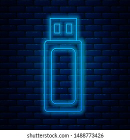 Glowing neon line USB flash drive icon isolated on brick wall background.  Vector Illustration