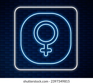 Glowing neon line Venus symbol icon isolated on brick wall background. Astrology, numerology, horoscope, astronomy.  Vector