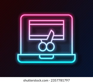 Glowing neon line Video recorder or editor software on laptop icon isolated on black background. Video editing on a laptop.  Vector
