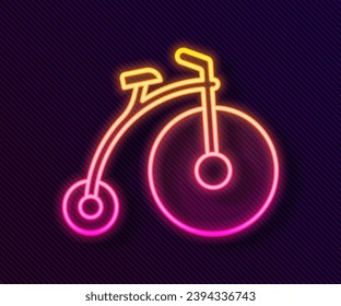 Glowing neon line Vintage bicycle with one big wheel and one small icon isolated on black background. Bike public transportation sign.  Vector