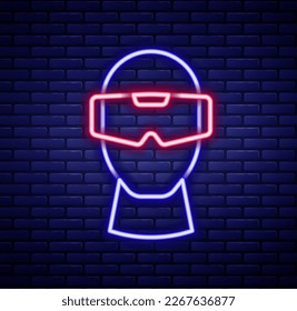 Línea de neón brillante Icono de gafas de realidad virtual aislado en el fondo de la pared de ladrillo. Máscara de vr 3d esterooscópica. Pantalla montada en la cabeza óptica. Concepto de esquema colorido. Vector