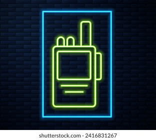 Glowing neon line Walkie talkie icon isolated on brick wall background. Portable radio transmitter icon. Radio transceiver sign.  Vector