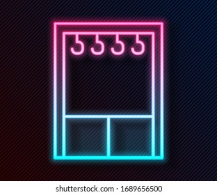 Glowing neon line Wardrobe icon isolated on black background.  Vector Illustration