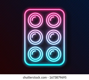 Glowing neon line Watercolor paints in box icon isolated on black background.  Vector Illustration