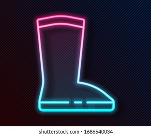 Glowing neon line Waterproof rubber boot icon isolated on black background. Gumboots for rainy weather, fishing, gardening.  Vector Illustration
