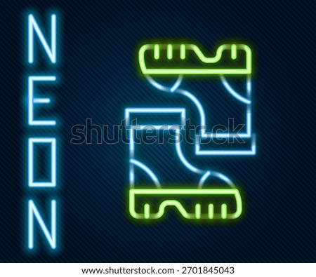 Glowing neon line Waterproof rubber boot icon isolated on black background. Gumboots for rainy weather, fishing, gardening. Colorful outline concept. Vector