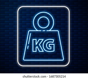 Glowing neon line Weight icon isolated on brick wall background. Kilogram weight block for weight lifting and scale. Mass symbol.  Vector Illustration