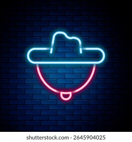 Glowing neon line Western cowboy hat icon isolated on brick wall background. Colorful outline concept. Vector