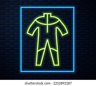 Glowing neon line Wetsuit for scuba diving icon isolated on brick wall background. Diving underwater equipment.  Vector