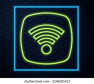 Glowing neon line Wi-Fi wireless internet network symbol icon isolated on brick wall background.  Vector
