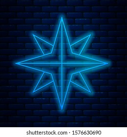 Glowing neon line Wind rose icon isolated on brick wall background. Compass icon for travel. Navigation design.  Vector Illustration