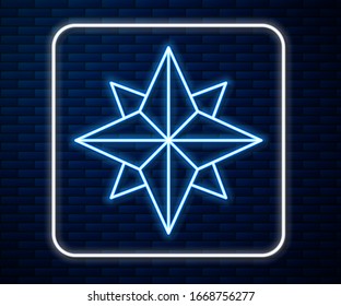 Glowing neon line Wind rose icon isolated on brick wall background. Compass icon for travel. Navigation design.  Vector Illustration