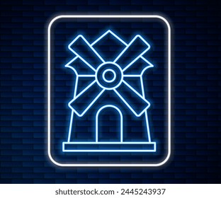 Glowing neon line Windmill icon isolated on brick wall background.  Vector