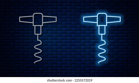 Glowing neon line Wine corkscrew icon isolated on brick wall background.  Vector