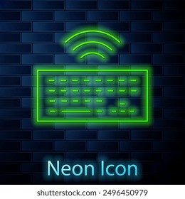 Glowing neon line Wireless computer keyboard icon isolated on brick wall background. PC component sign. Internet of things concept with wireless connection.  Vector