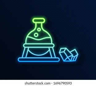 Línea de neón brillante Cauldrón de bruja e icono de piedra mágica aislado en fondo azul. Ilustración vectorial
