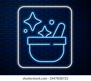 Glowing neon line Witch cauldron icon isolated on brick wall background. Happy Halloween party.  Vector