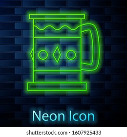 Glowing neon line Wooden mug icon isolated on brick wall background.  Vector Illustration