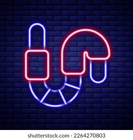 Glowing neon line Worm icon isolated on brick wall background. Fishing tackle. Colorful outline concept. Vector