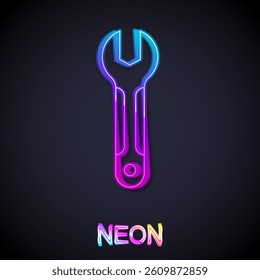 Glowing neon line Wrench spanner icon isolated on black background. Spanner repair tool. Service tool symbol.  Vector