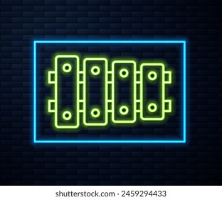 Glowing neon line Xylophone - musical instrument with thirteen wooden bars and two percussion mallets icon isolated on brick wall background.  Vector