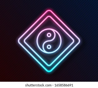 Glowing neon line Yin Yang symbol of harmony and balance icon isolated on black background.  Vector Illustration