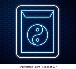 Glowing neon line Yin Yang and envelope icon isolated on brick wall background. Symbol of harmony and balance.  Vector Illustration